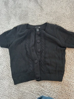 Stickad kofta  - Kommer ej till användning 