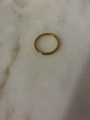 Guld ring rostfritt stål - Helt oanvänd , köpt utomlands 