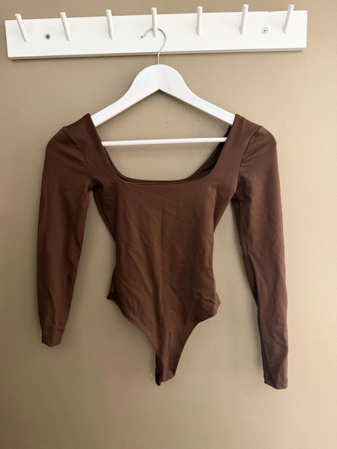 Brun långärmad body från Zara