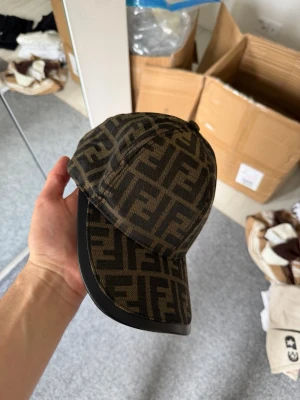 Fendsi black and brown cap - Unused, brand new and fresh. Please feel free to ask questions.