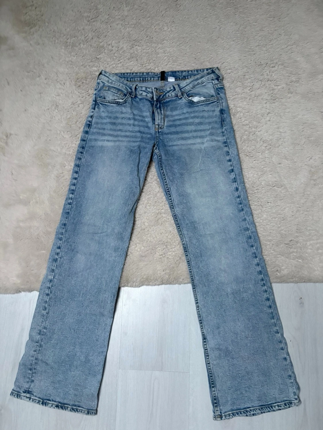 Ljusblå bootcut jeans