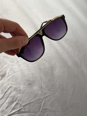 Glasögon  - Solglasögon 