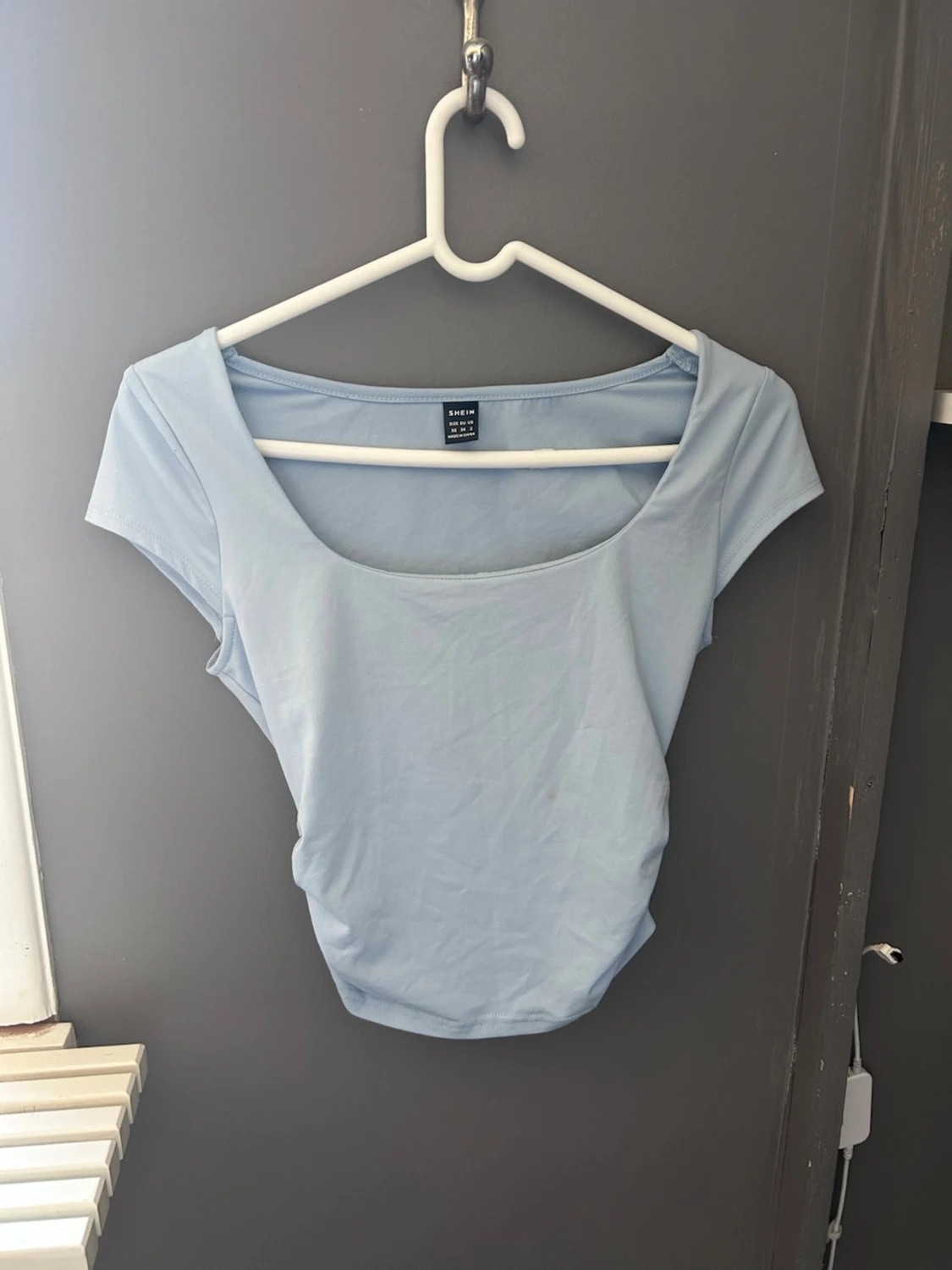 Ljusblå croppad topp