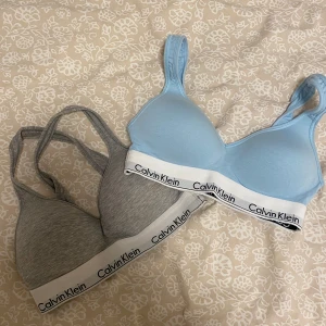 Calvin Klein bh:ar - Fint skick, storlek S, den blåa är såld men den gråa finns kvar. jätteskön men kommer tyvärr inte till användning 