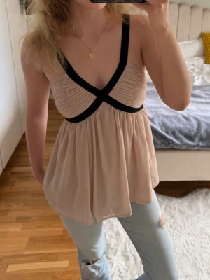 Pelplumtop  - Pelplumtop som passar både till jeans, shorts och kjol! 