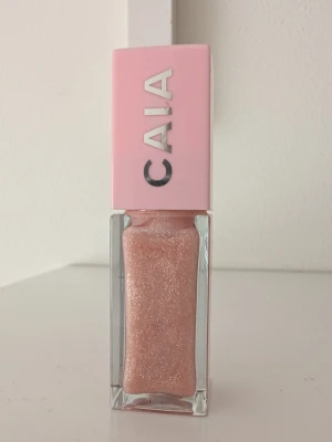 SÅLD CAIA ljusrosa läppglans - Caia Pinky Gloss. Bara testad