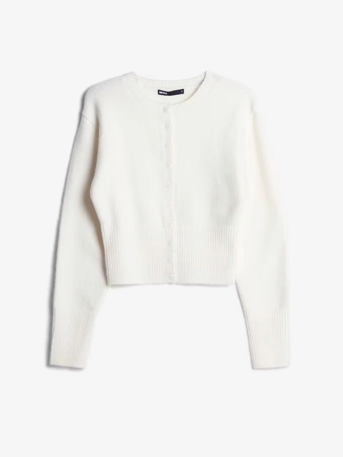 Vit  kofta med knappar