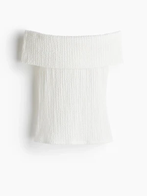 Vit off shoulder topp i smock - Trendig vit off shoulder topp från HM. En tröja som man kan ha på olika sätt (se bilderna). Helt ny med prislapp, säljer i storlek Xs.