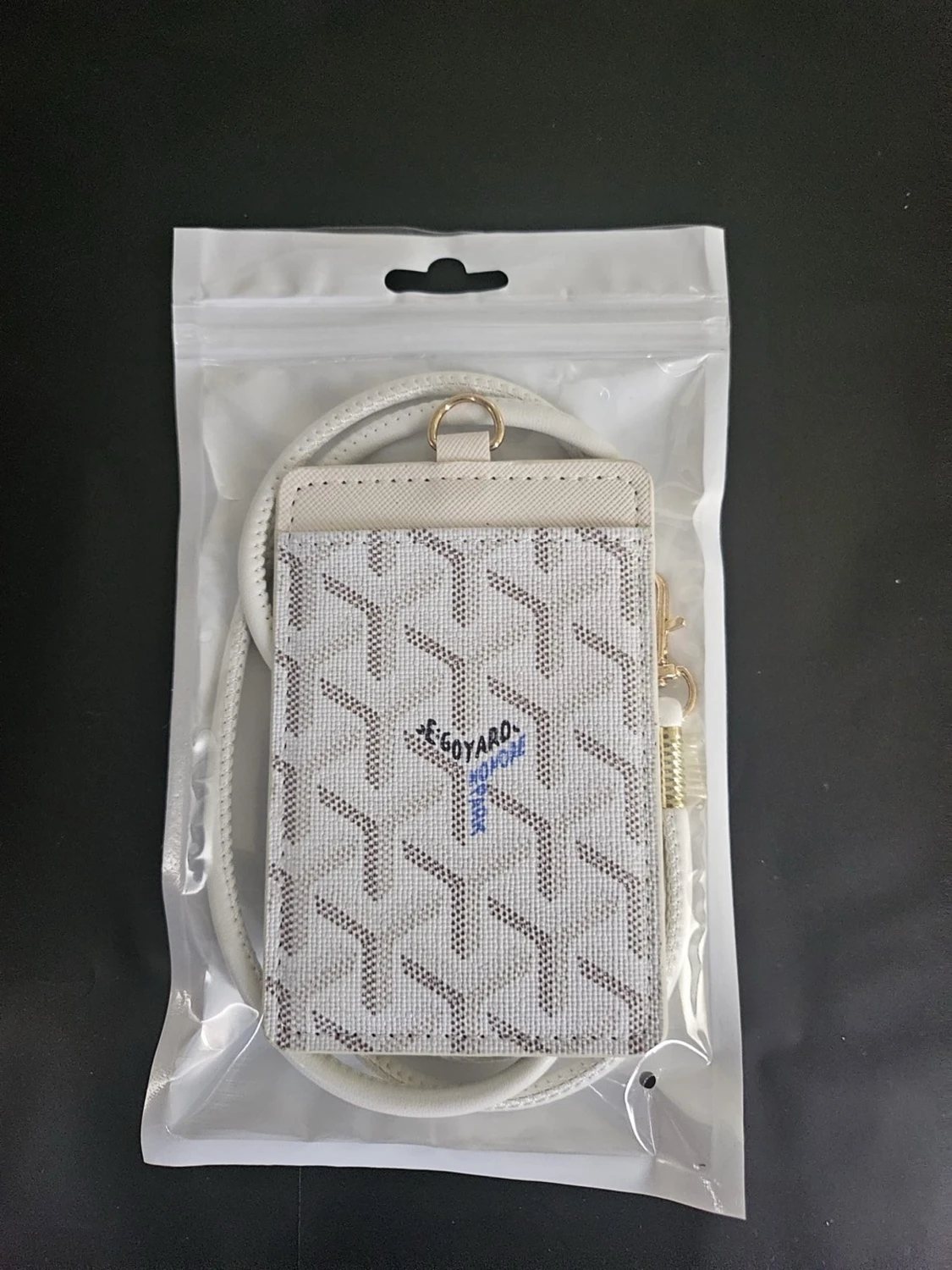 Vit korthållare med snodd