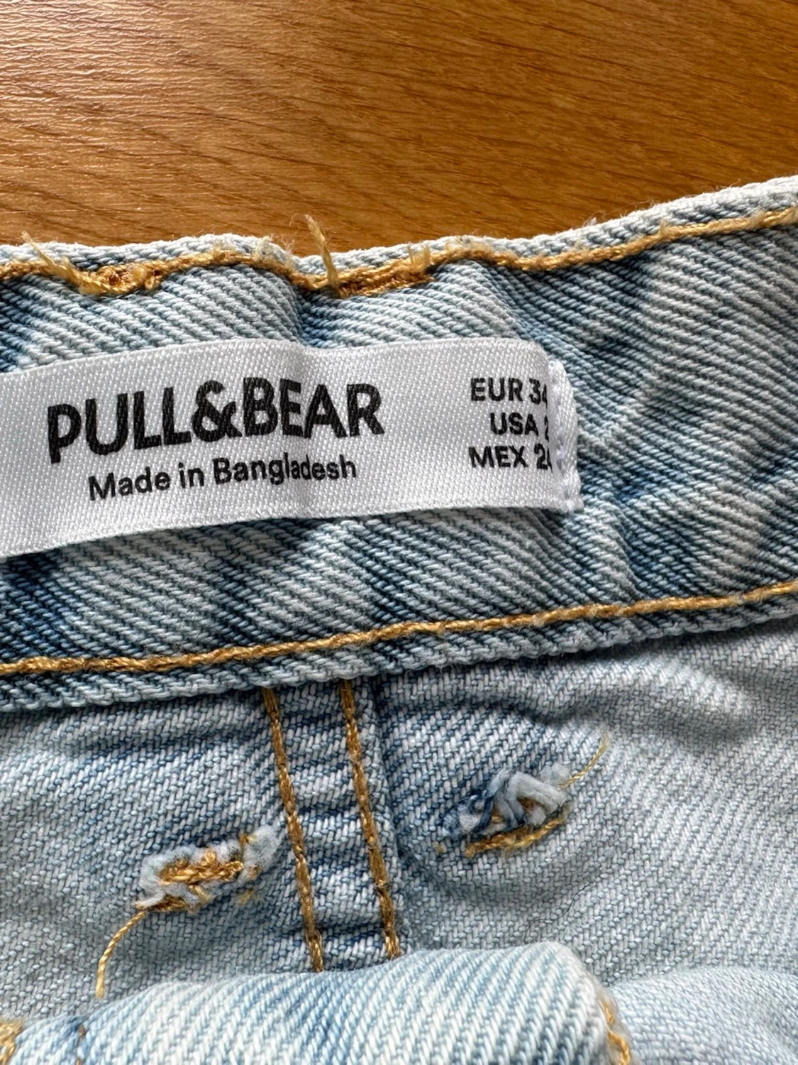 Ljusblå jeanskjol med fransig kant - 2