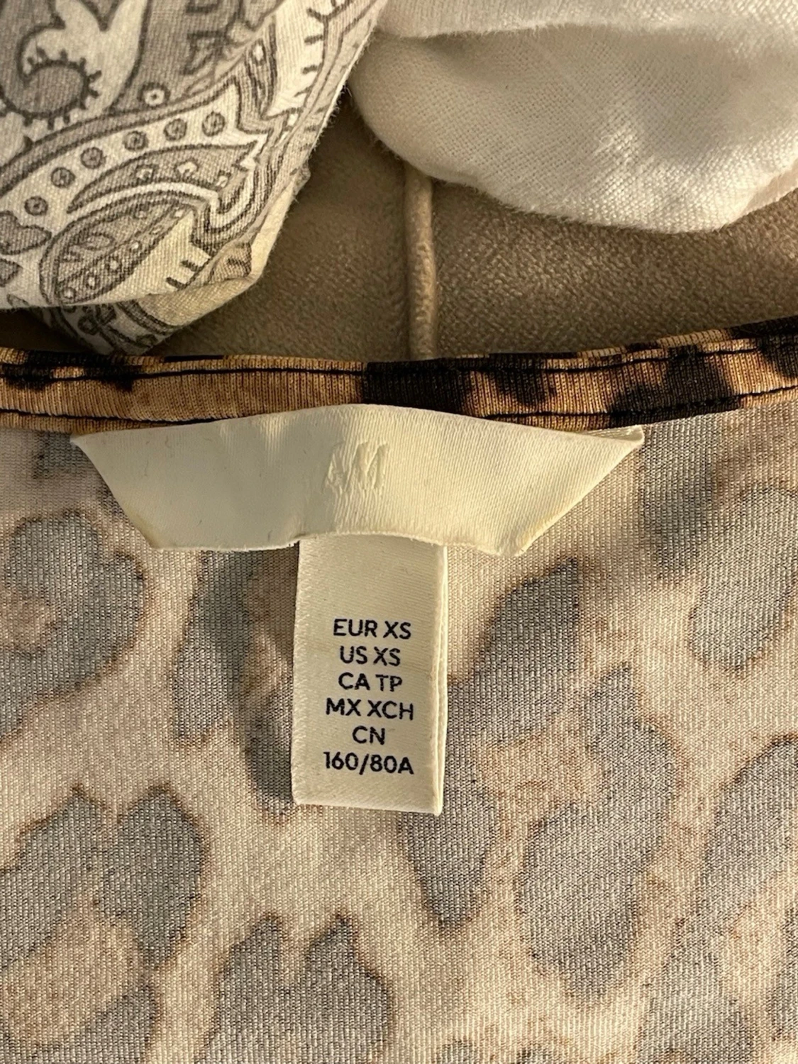 Leopardmönstrad ärmlös body - 3