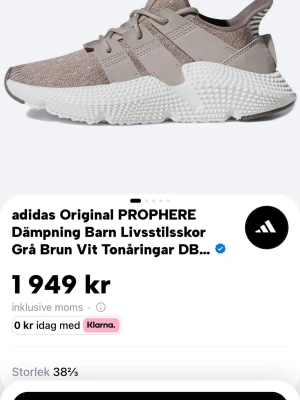 adidas Prophere sneakers grå/brun - Snygga adidas Prophere sneakers i grått och brunt med chunky vit sula. Ovandelen är i mesh och syntet med breda band och cool design. Perfekta för dig som gillar streetwear och vill sticka ut med en unik look.