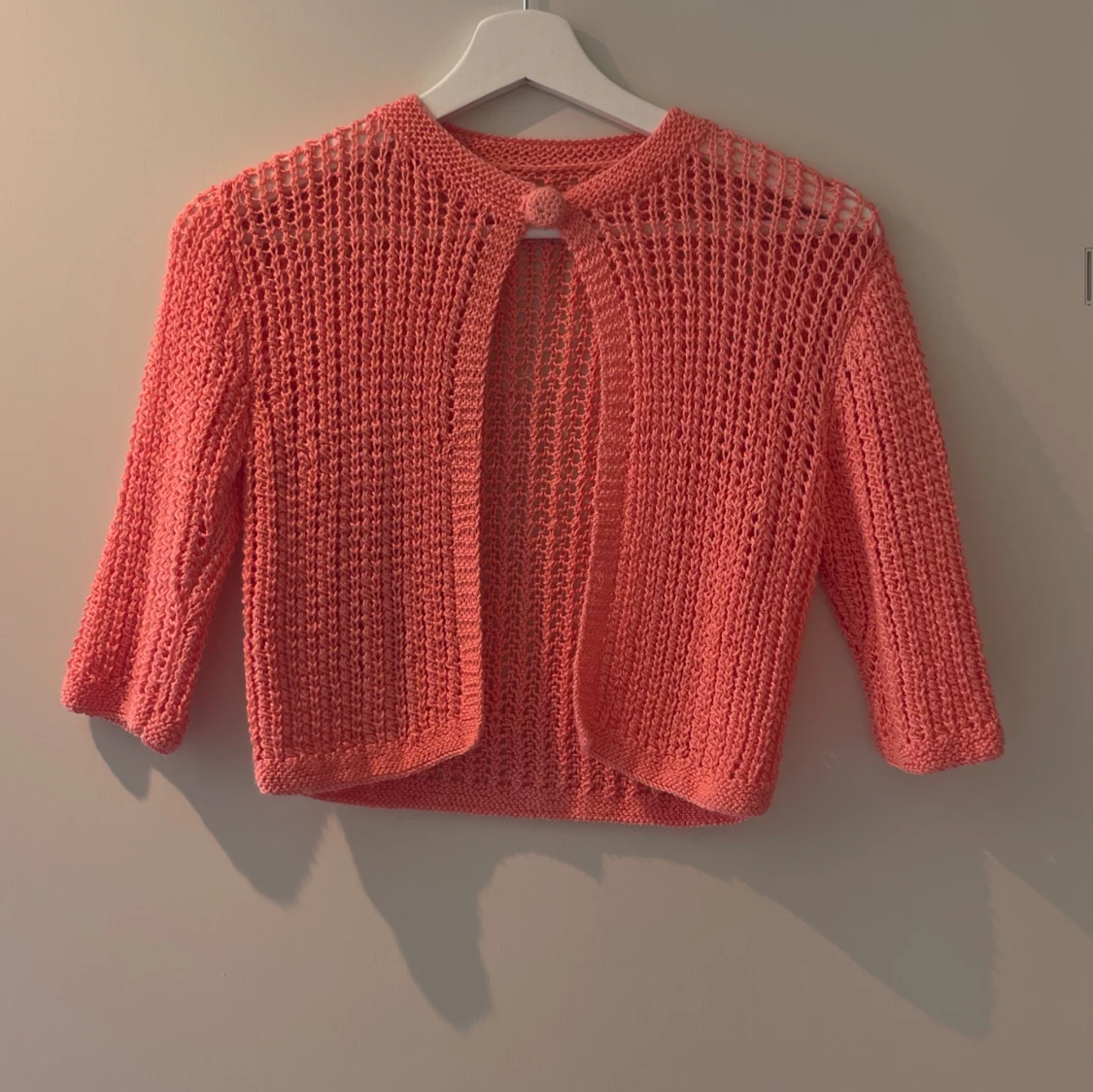 Pink knitted cardigan
