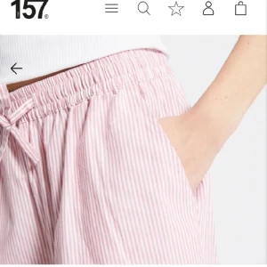Randiga pyjamas byxor  - Pyjamas byxor i bomull, rosa och vit randiga.  Har två par både i xs och s