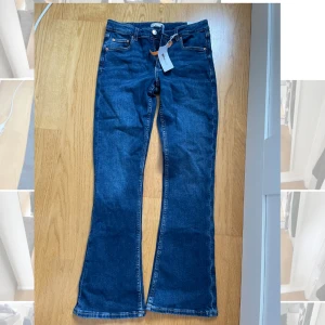 Utsvängda lågmidjade jeans - Snygga lågmidjade flare jeans från Ginatricot, storlek 164 men passar en stor XS eller en S, aldrig använda med lappar kvar 