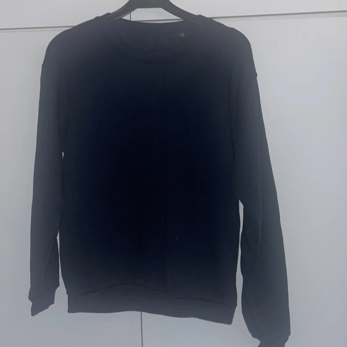 Tröja med tryck på ryggen - 90