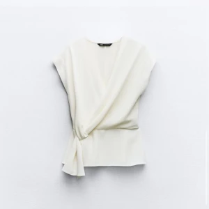 Vit blus - Kommer inte till andvöning 