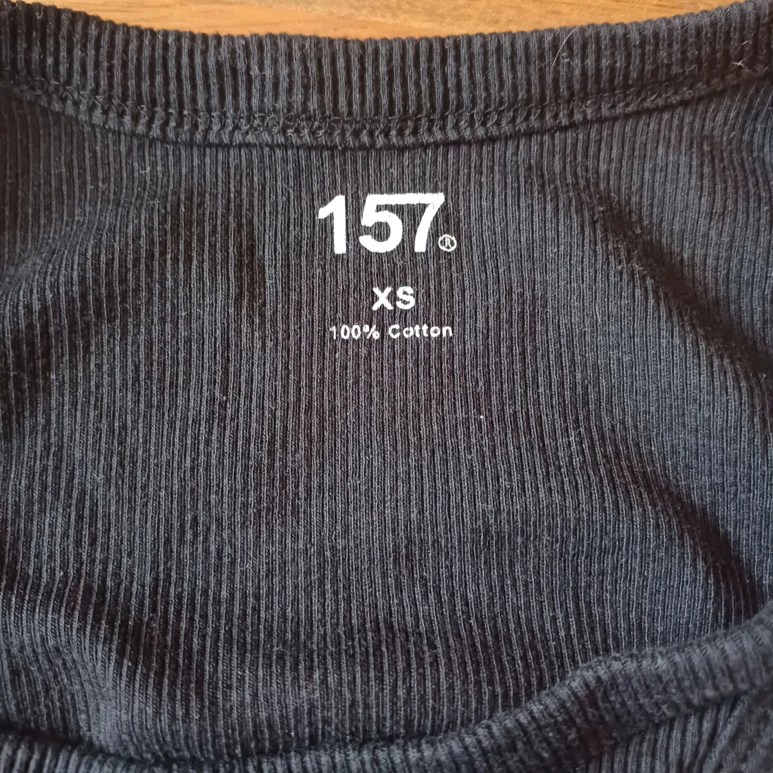 Svart ribbad linnetopp från 157 - 91