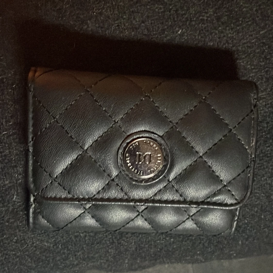 Svart quiltad plånbok från Don Donna