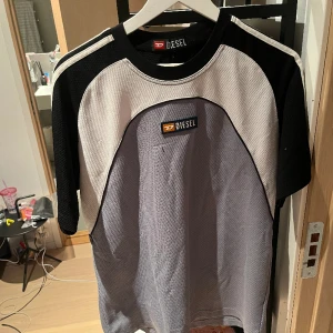 Retro Diesel tröja - Snygg retro diesel tröja i storlek M/L. Har ett litet märke på bröstet ( se bild) men utöver det är den i gott skick.