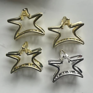 Stjärna hårklämmor - 3st i guld, 1st i silver, 70kr/st