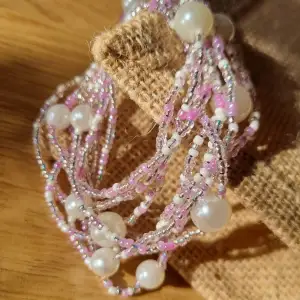 Long strand of mix beads and pink pearls that can signify your uniqueness and express yourself in style. It shines.  Handmade/Handcrafted.  3way fashion accessory necklace,bracelet and anklet. 