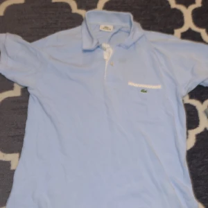 Lacoste piké tröja  - Bra skick använt några få gånger 