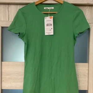 Klänning  - står Xl men är som M Helt ny 