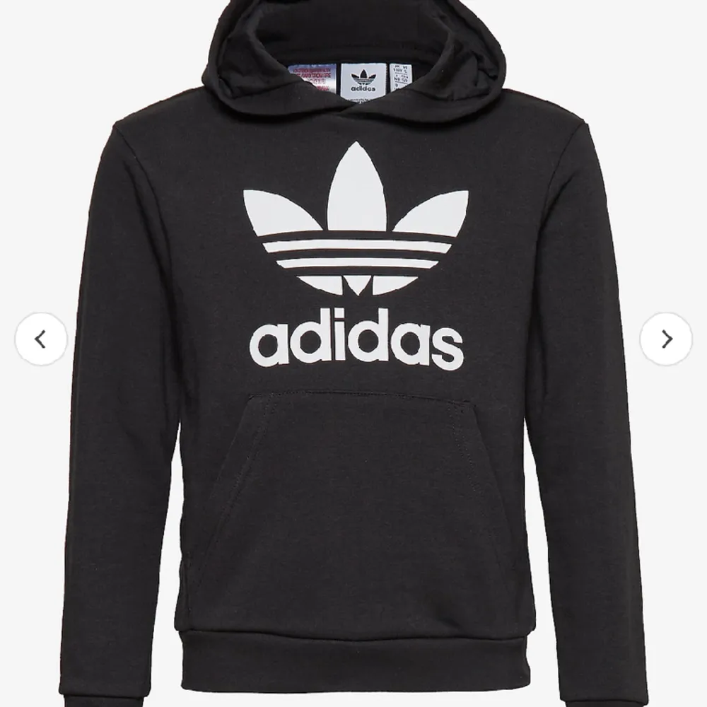 En svart adidas hoodie, ordinarie pris 350kr. Hoodies.