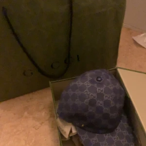 Gucci keps  - Använd bara 1 gång ser ej bra ut på mig därför jag säljer den