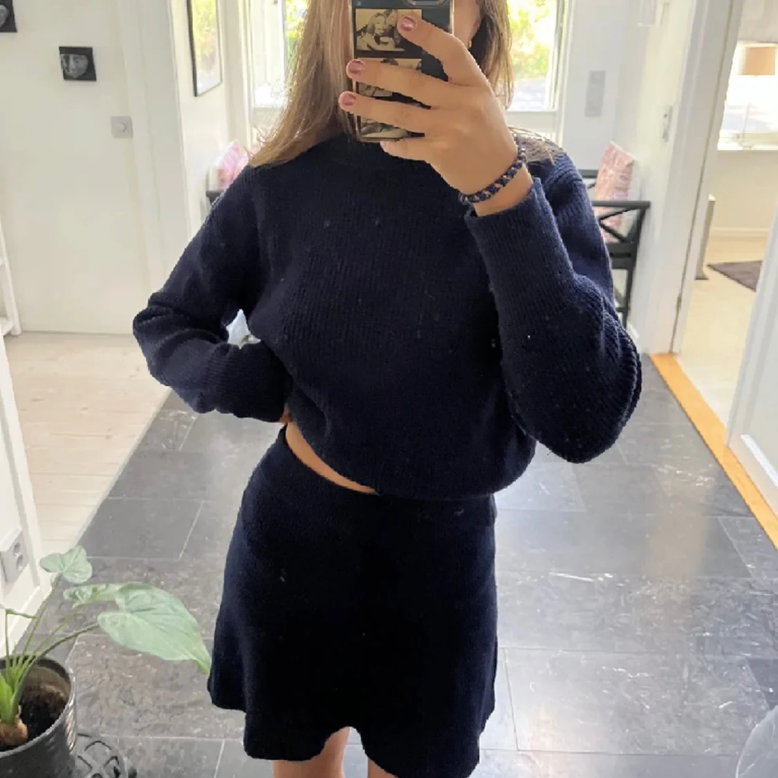 Stickad tröja med rund krage