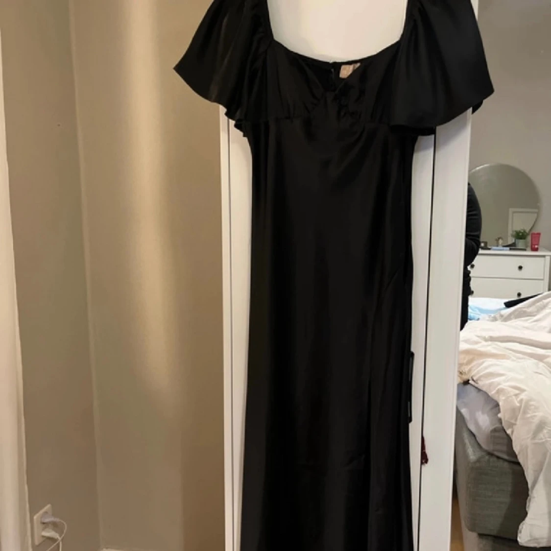 Svart långklänning med slits