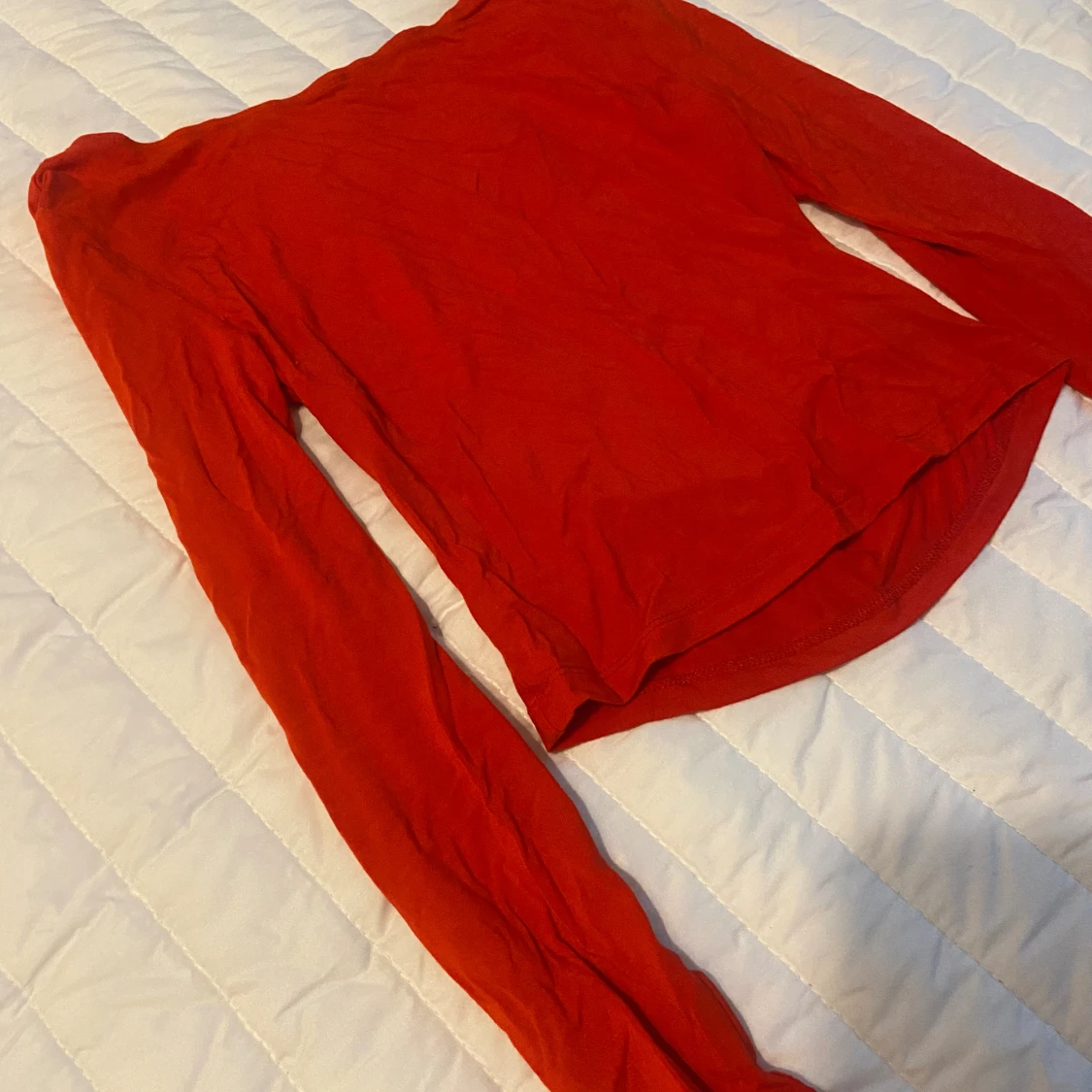 Rygglös röd tröja 