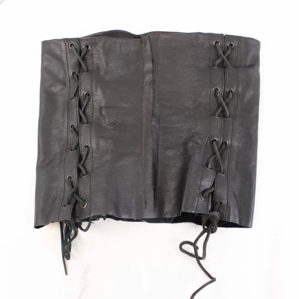 Hodakova  Leather trousers top Lace up corset from upcycled leather pants . Toppar.