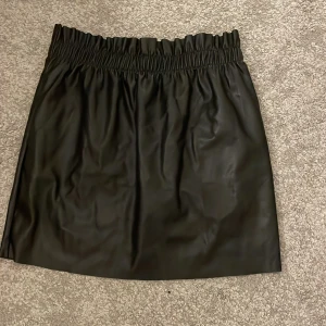 Kort kjol - Ärvd och aldrig använd av mig. 