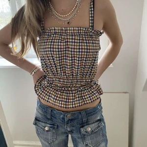 Rutig topp - Så snygg, ganska tajt resår så skulle säga XXS