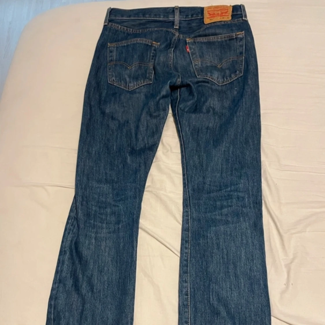 Mörkblå levisjeans  - 91