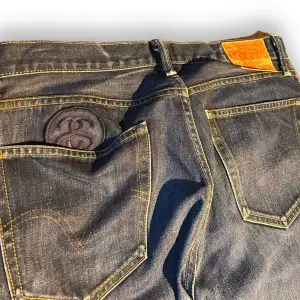 Stussy  Levi's Jeans  Size W34 L32 Levi's, Stussy collaboration denim.  Lot number: SS505   Great Condition  Measurements Top: Waist : 44cm straight over Length: 110cm