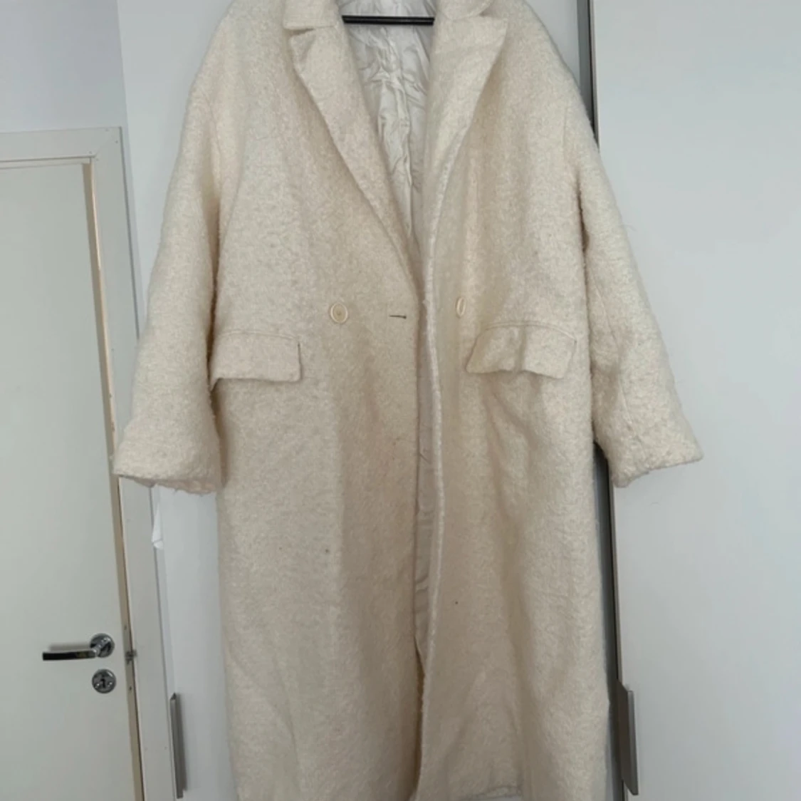 Créme färgad kappa - 90