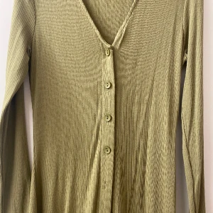 Grön maxiklänning (tight)  - Lång, tight, storlek S 