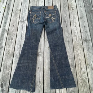 Bootcut jeans - snygga jeans från gina strlk Xs uppsydda längst ner, kom privat för mått. har ej bild på då de är alldeles för små