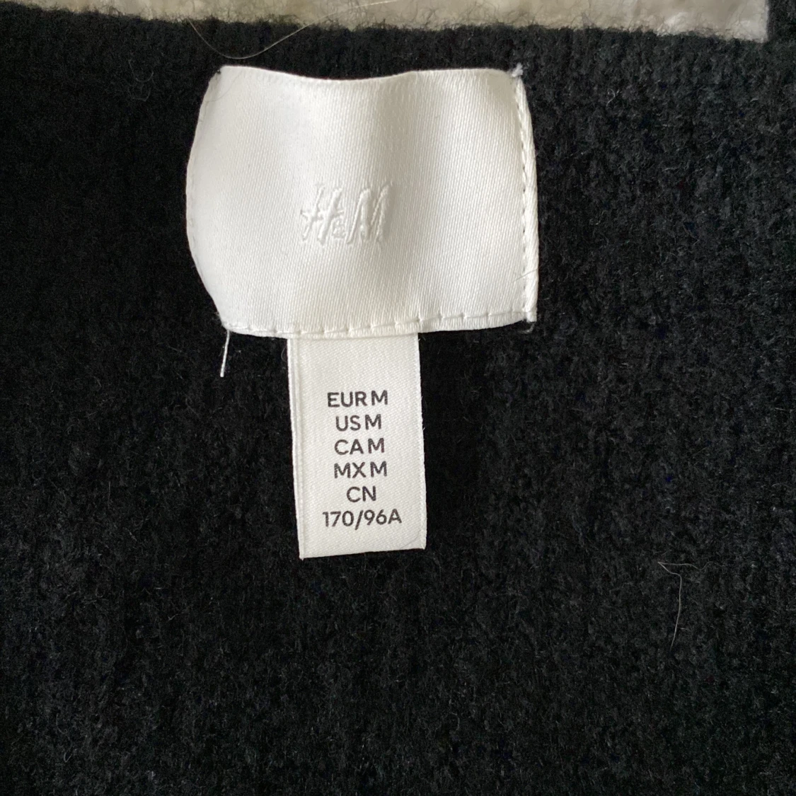 Svart stickad klänning från H&M - 91
