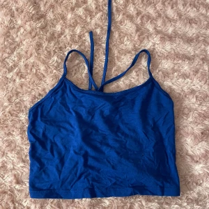 Blå topp  - Aldrig använt, var för liten.