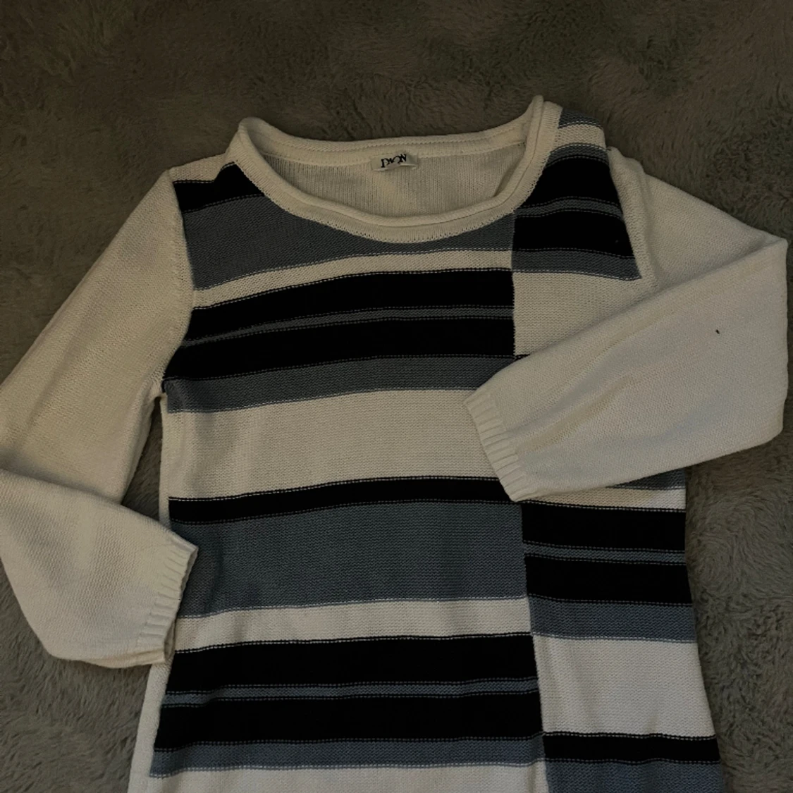 Stickad trekvart tröja