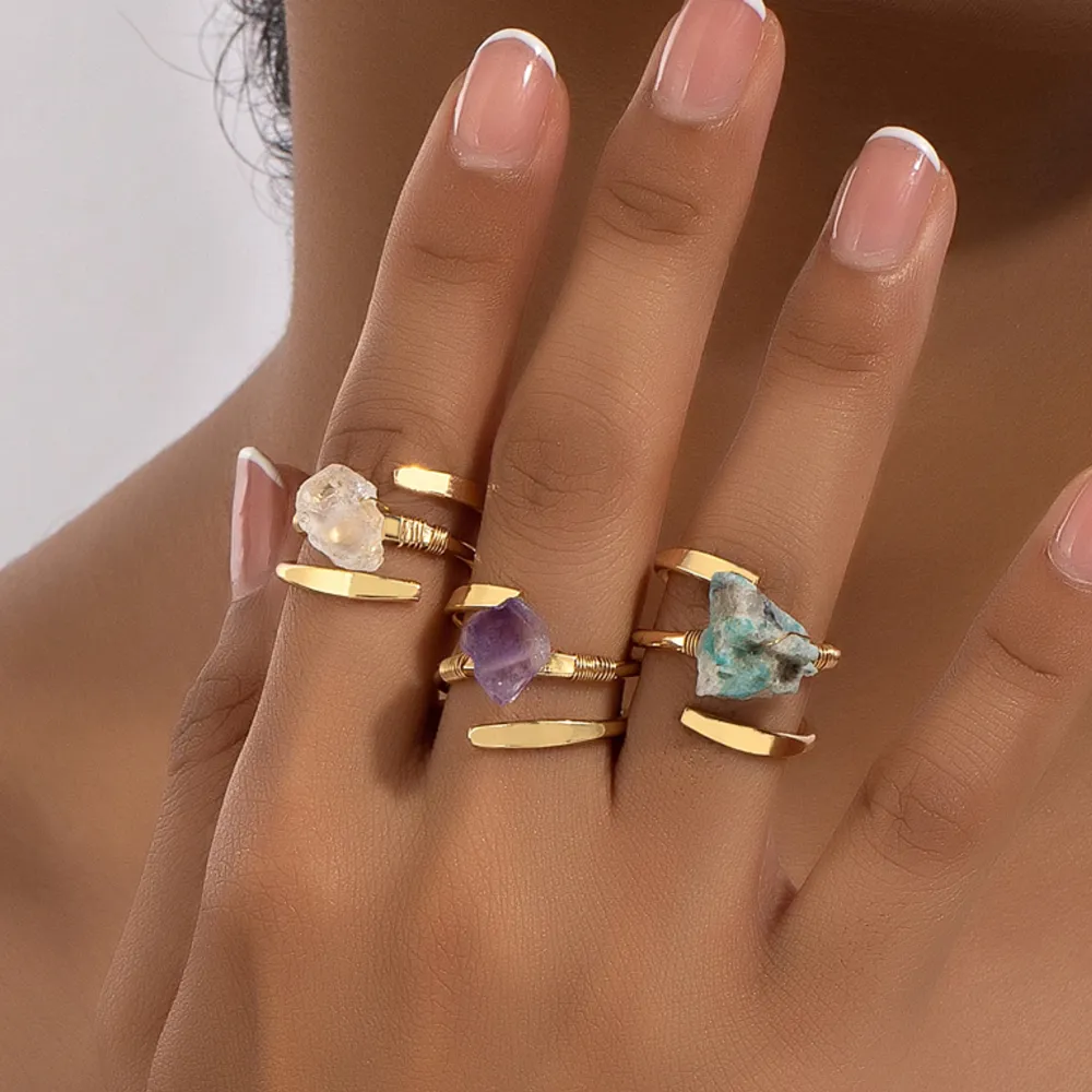 Unique for every piece, new, gold plated, natural Crystals, 3 rings in one set . Accessoarer.
