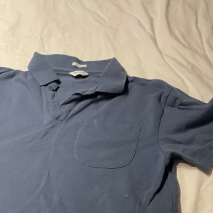 EAST WEST - piké  - East west piké köpt från brothers. Sparsamt använd.