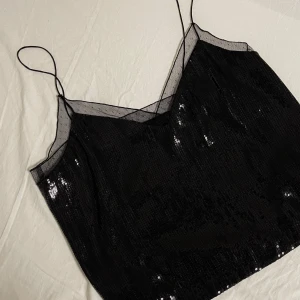 Glittrig paljett top  - Glittrig paljett top som endast har används 1 gång. 