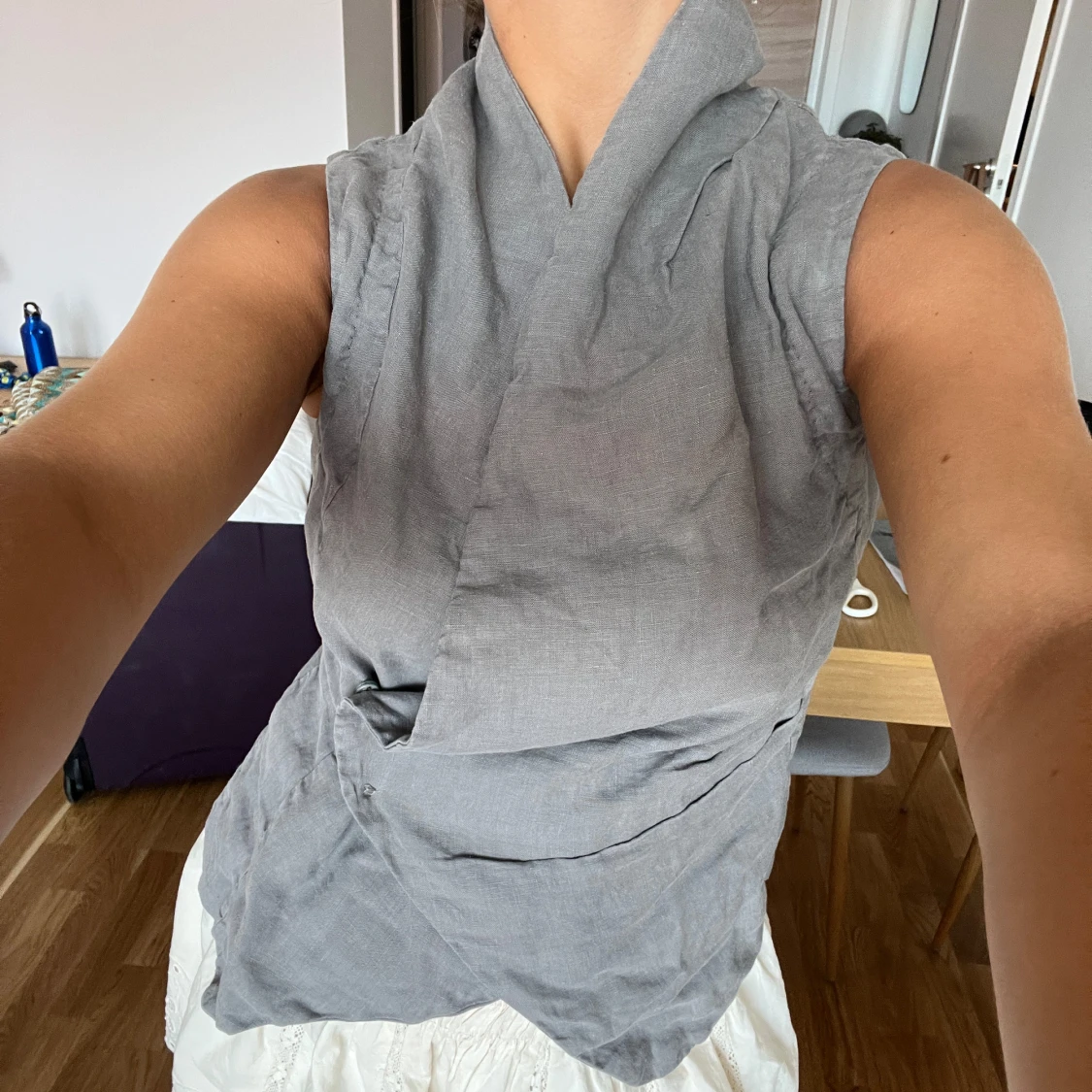 Fin väst som går att ha på olika sätt - 90