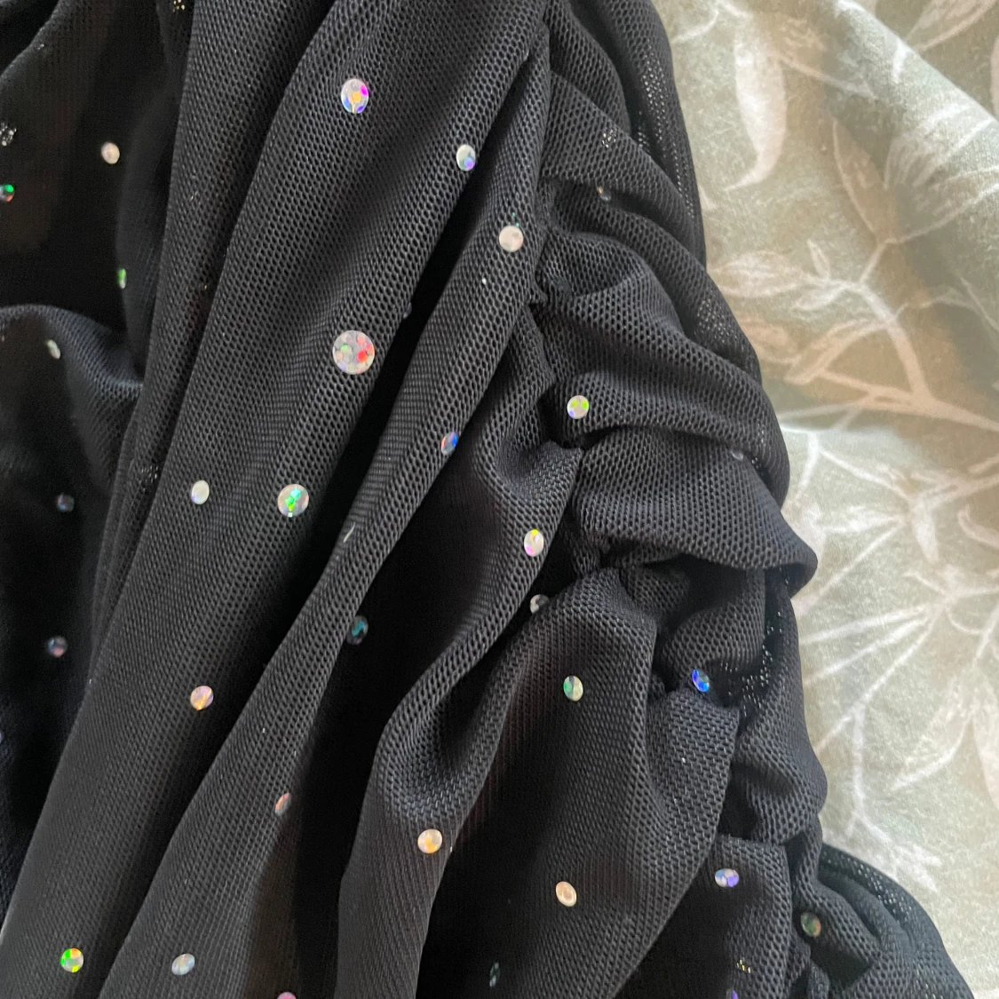 Glittrig klänning - 91