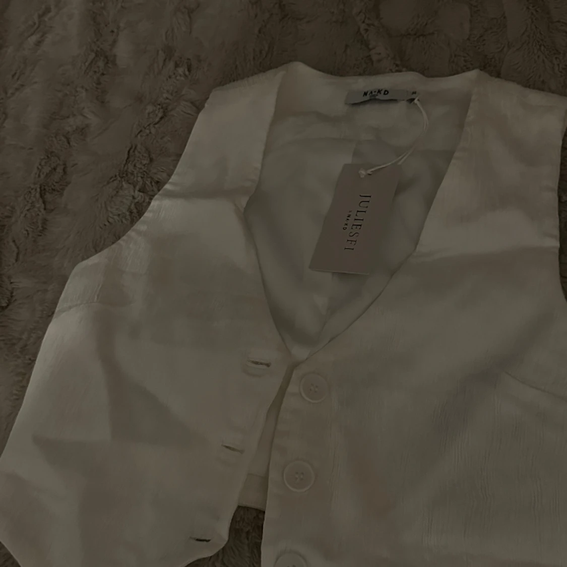 Plisserad vit väst - 91